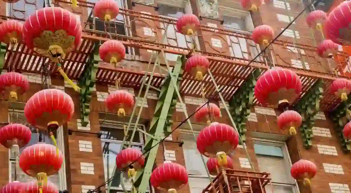 Lanterns hang outside a building on Grant Street in Chinatown, San Francisco