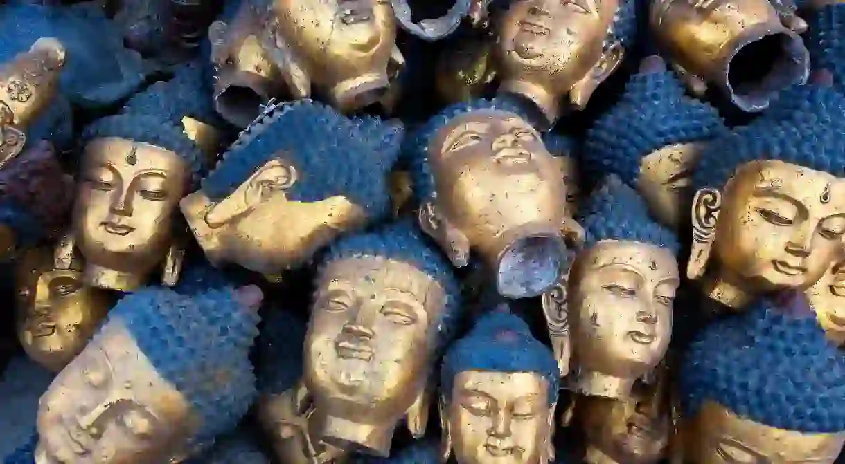 Sculptures are on display at the Panjiayuan Antique Market in Beijing