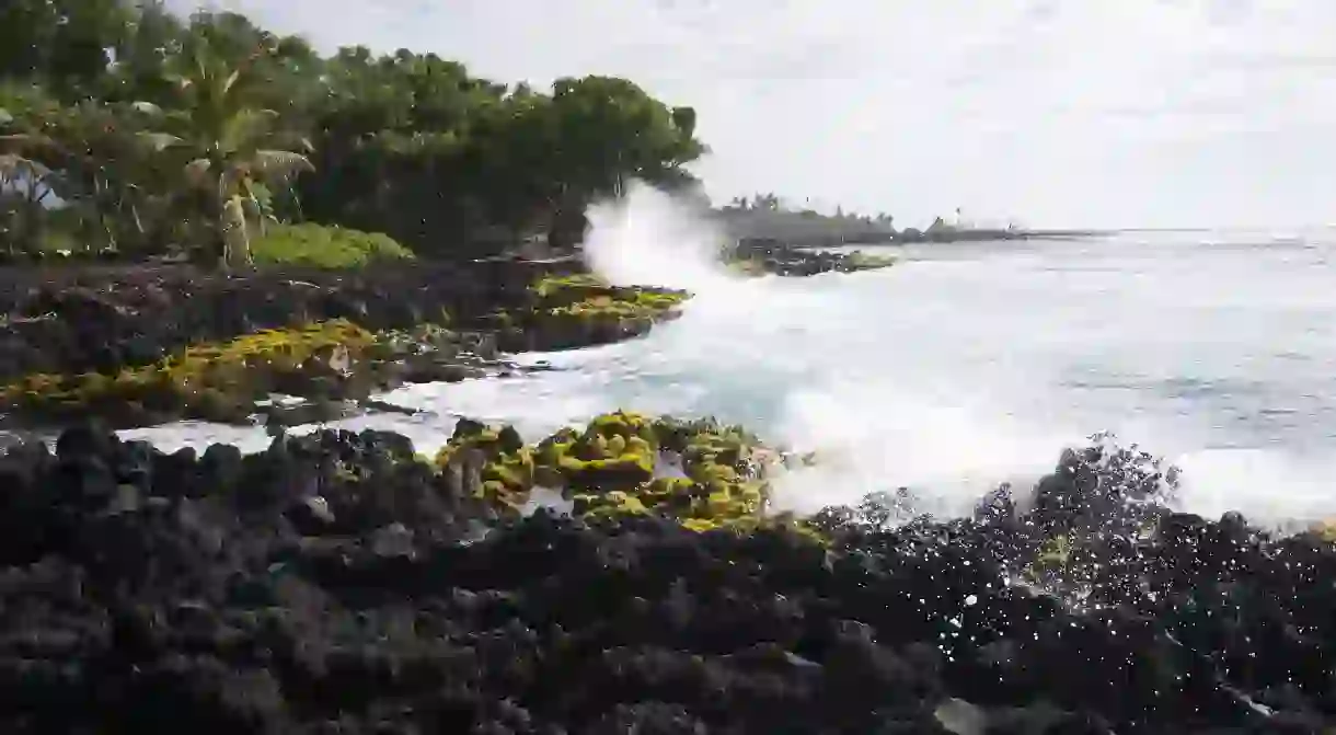 Waves crash ashore at Isaac Hale Park on the island of Hawaii