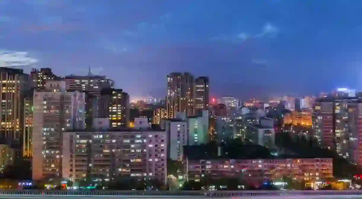 The skyline glows at night in Beijing, China