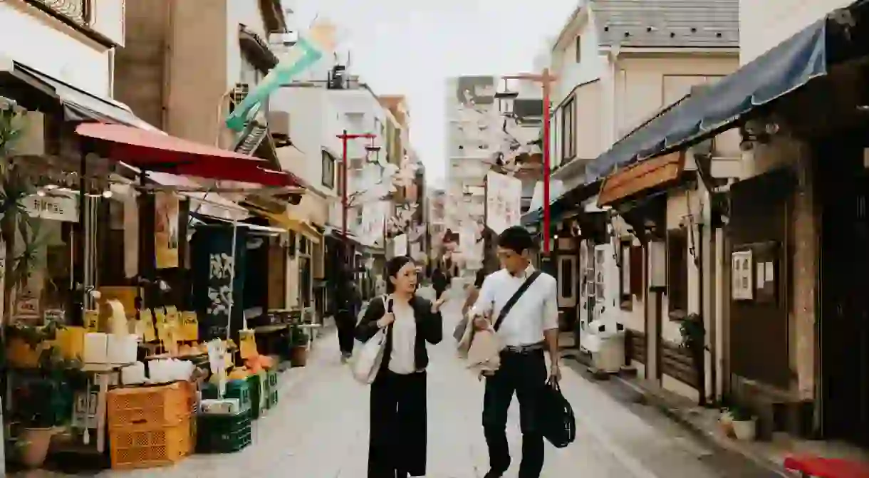 Satoko Utsugi leads groups around Tokyo while teaching them about sake