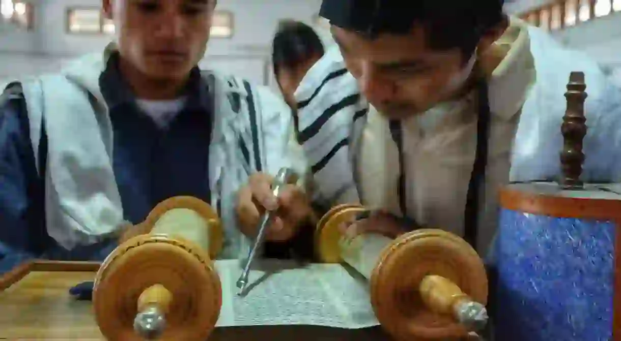 Bnei Menashe Jewish men read from the Torah