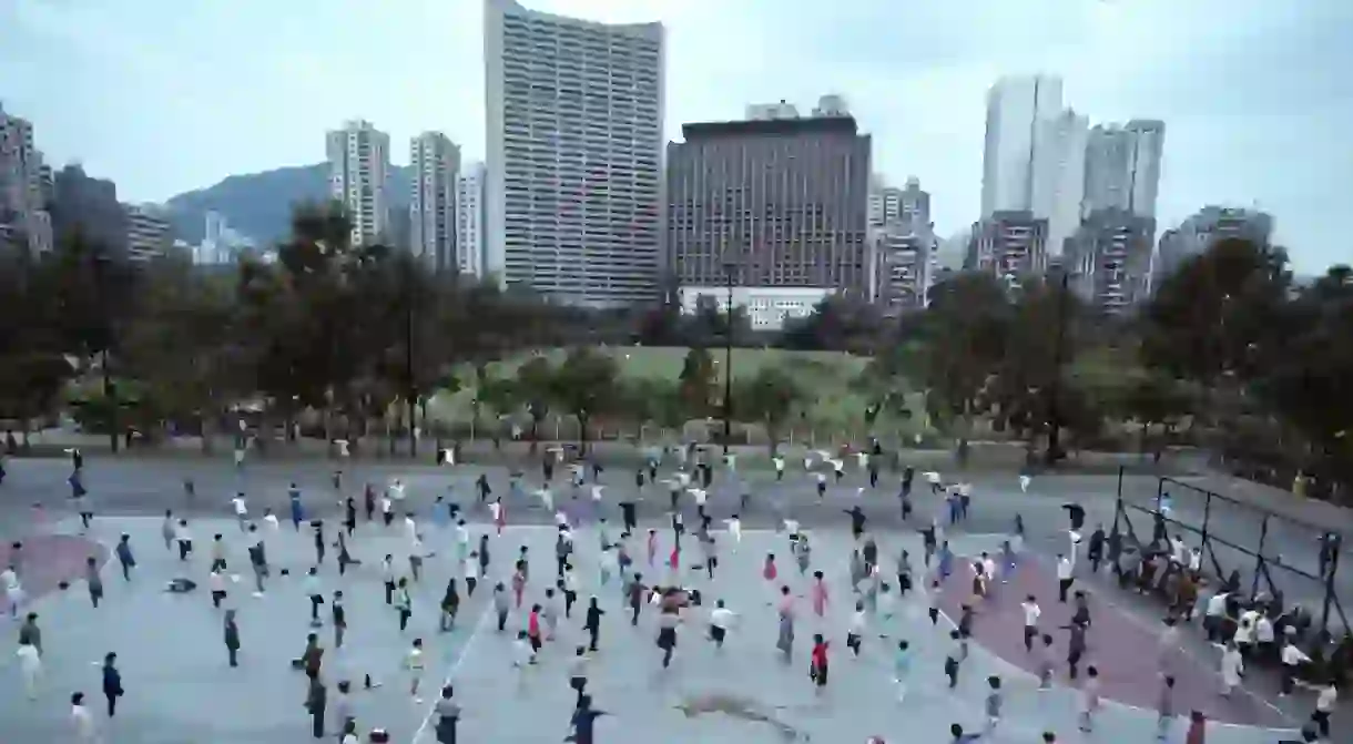 Morning tai chi exercise class in Hong Kongs Central Park