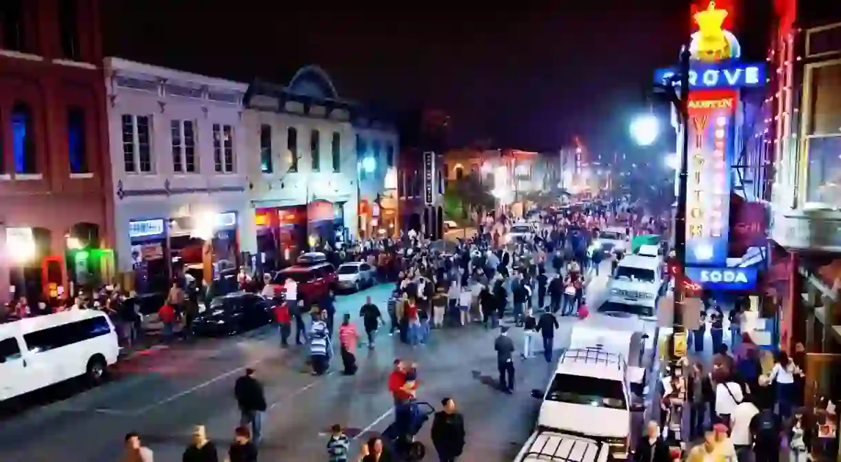 Revelers crowd Sixth Street in Austin during SXSW