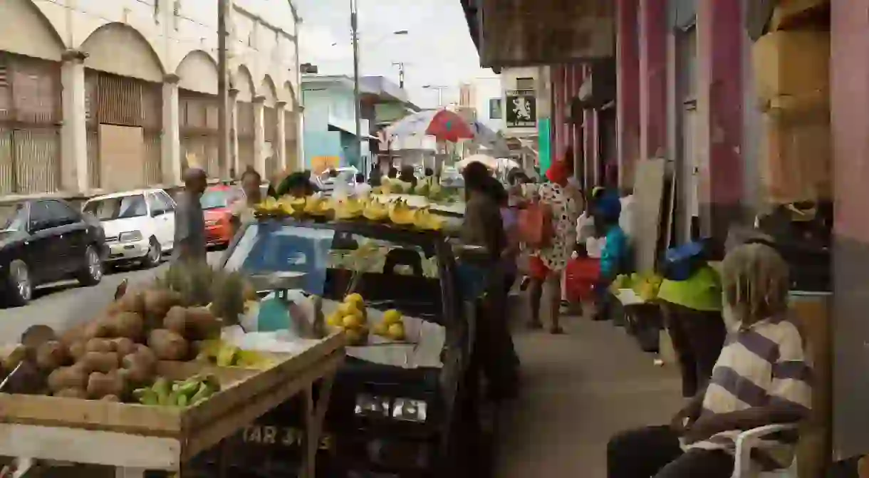 Fruit trader selling bananas and fruit, Trinadad and Tobago