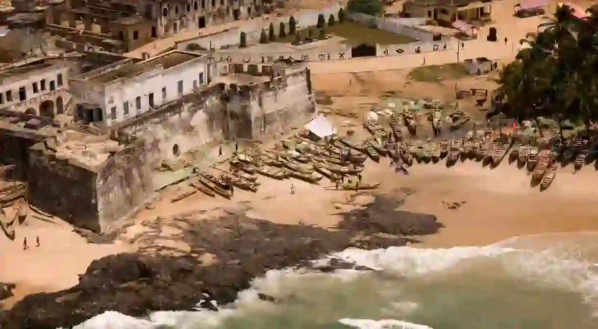 West of the city of Accra, the Ghanaian coast is alive with fishing boats and people bustling around a 15th-century fort