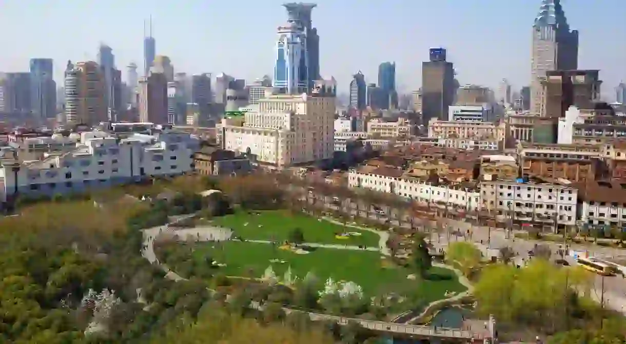 Skyline over inner city park. Shanghai, China.