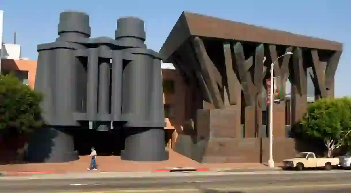 These giant binoculars stand in front of a building designed by architect Frank Gehry in Venice Beach