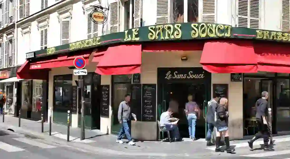 People visit Le Sans Souci in Paris, France