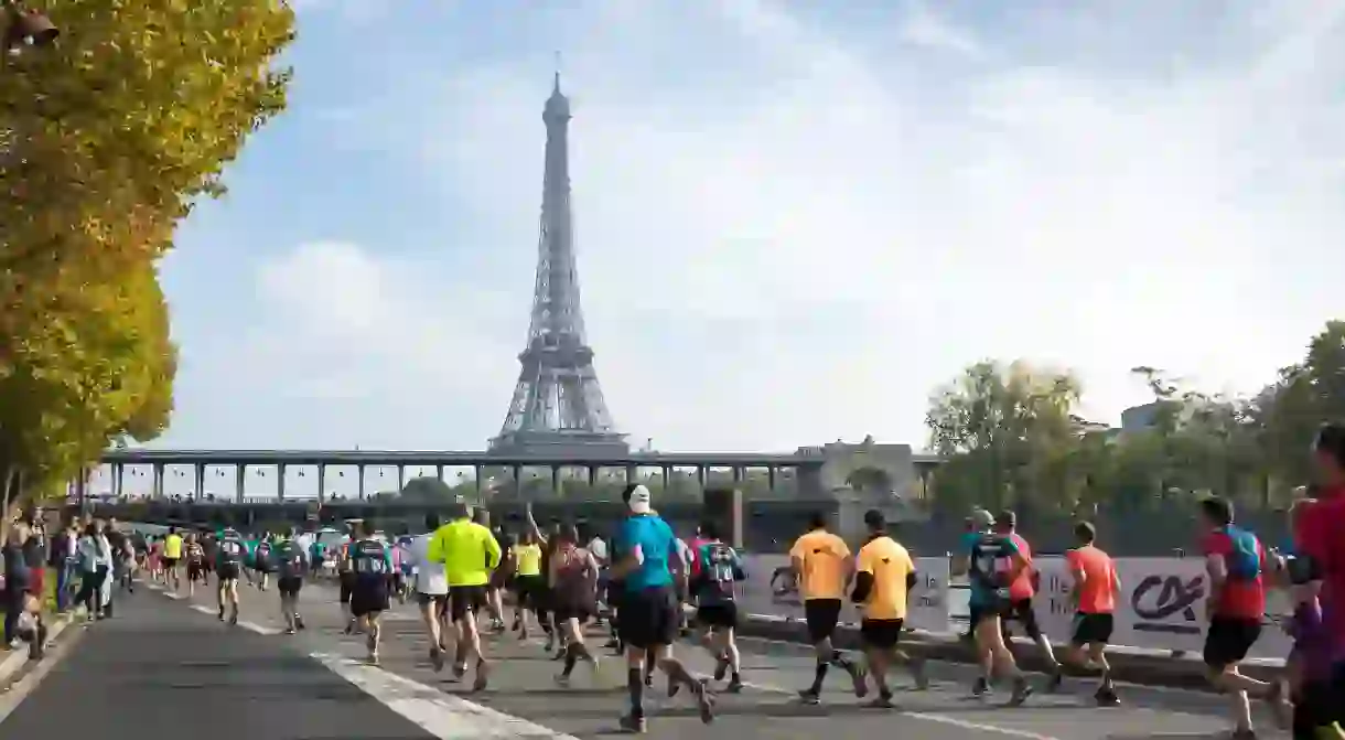 Runners take part in a race in Paris