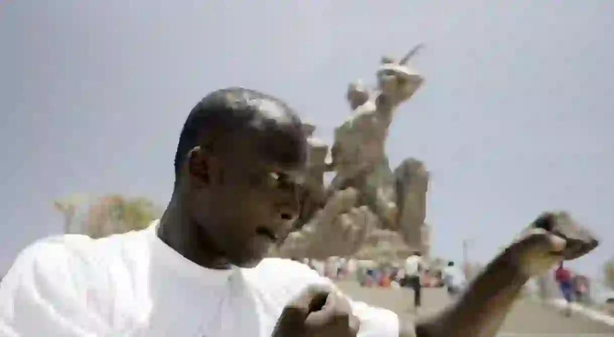 La lutte fights are the talk of school-grounds, offices and social gatherings across Senegal