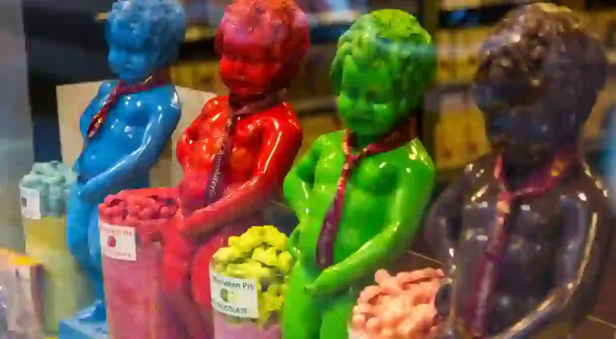 Souvenir shop with multicoloured Manneken Pis figures, Brussels