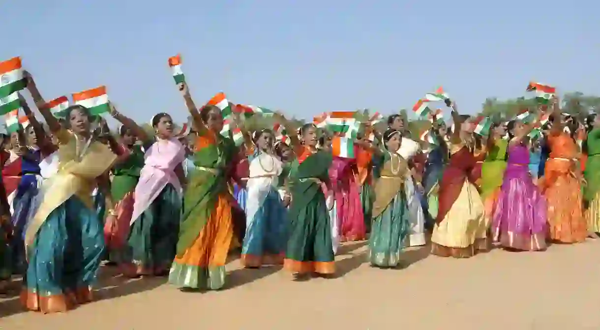 Women perform a dance on Independence Day in Kerala, India