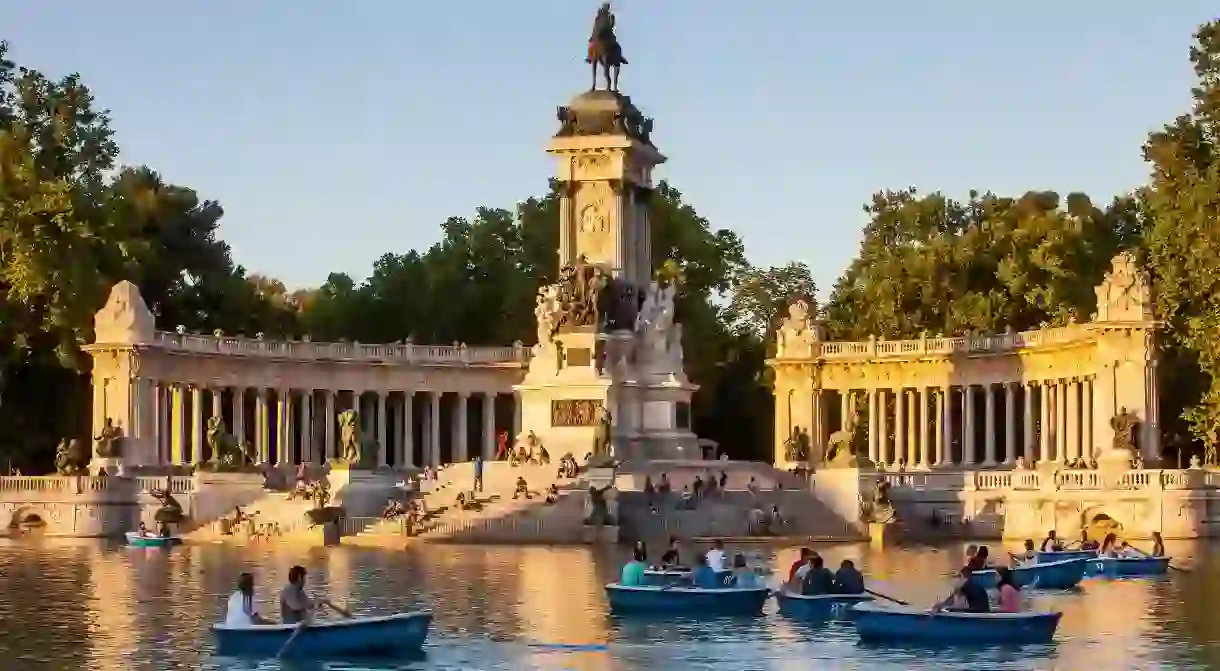 Enjoy an intimate boat ride on the lake in Retiro Park