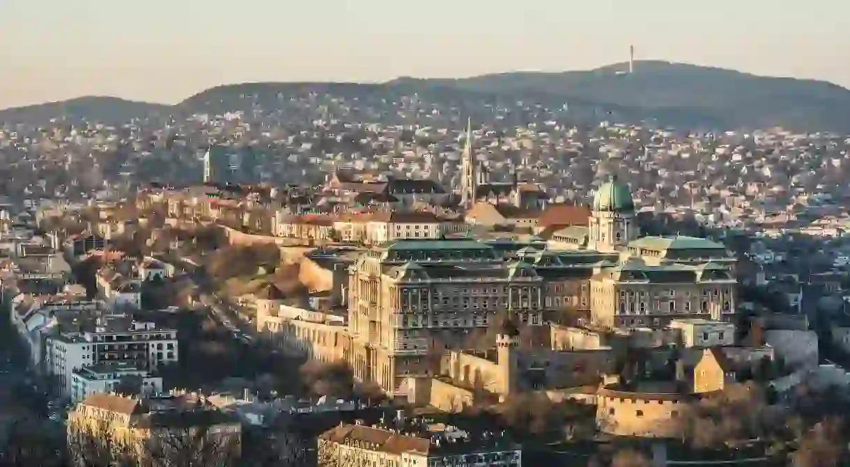 Skyline Of Budapest From Gellért Hill, with Buda Castle in the foreground.