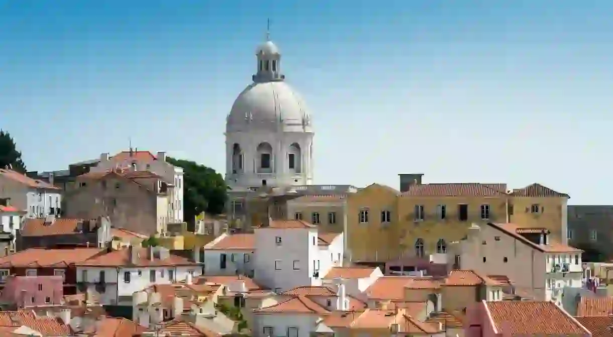 Lisbon’s Alfama neighbourhood is a maze of cobblestone alleys with amazing city views