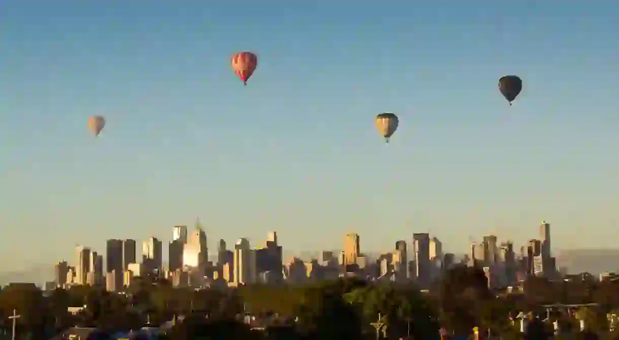 Hot air balloons fly over Melbourne