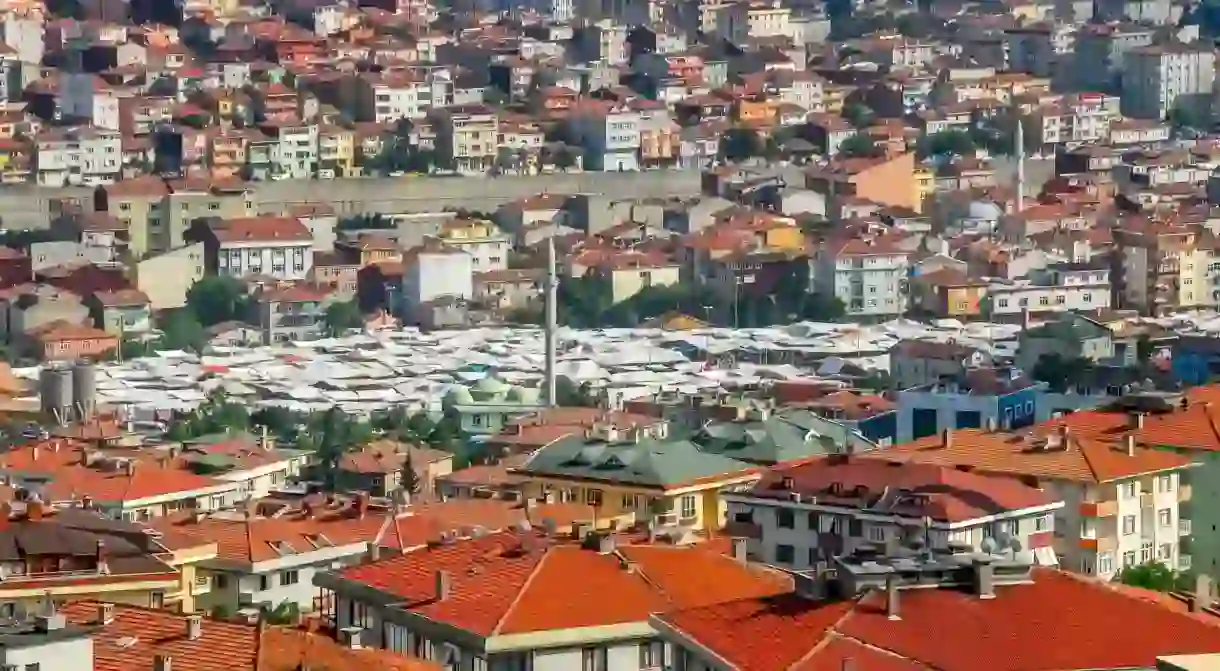 A view over rooftops to the tented canopies of Kadikoy market, Istanbul