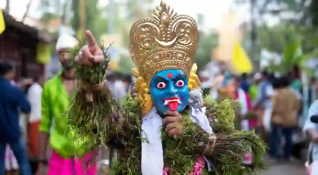 Traditional kummatti folk dance performers during Onam Celebration