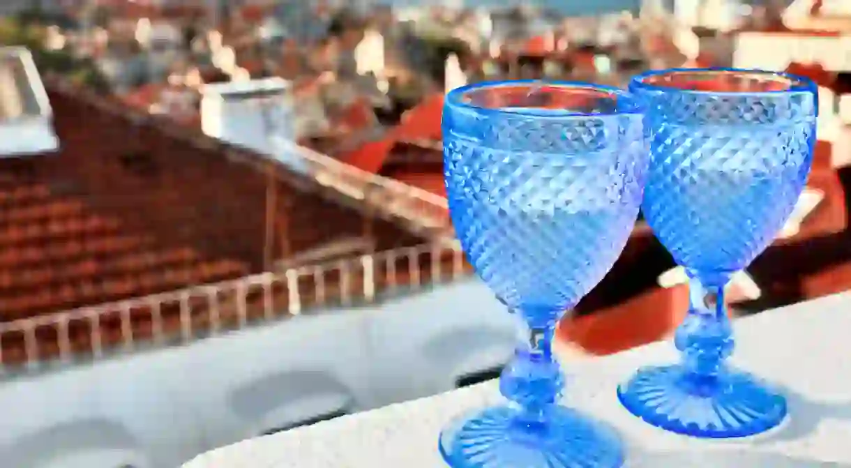 Two glasses of white wine on the roof of Lisbon.