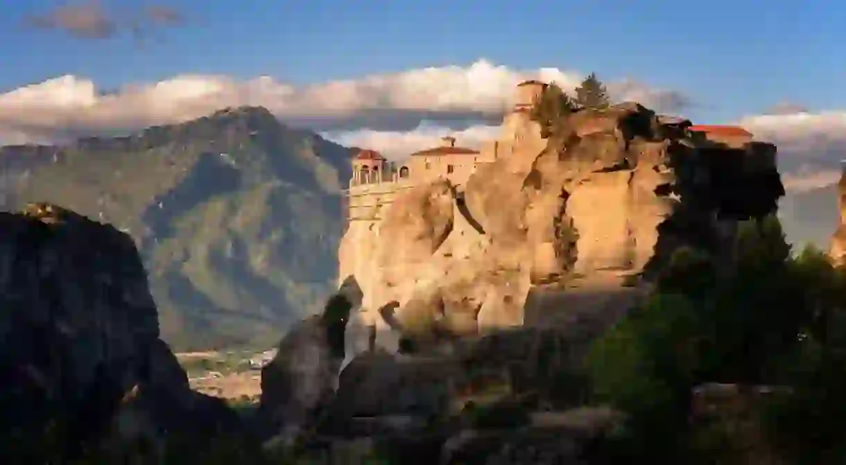 The distinctively shaped rocks of Meteora rise into the sky