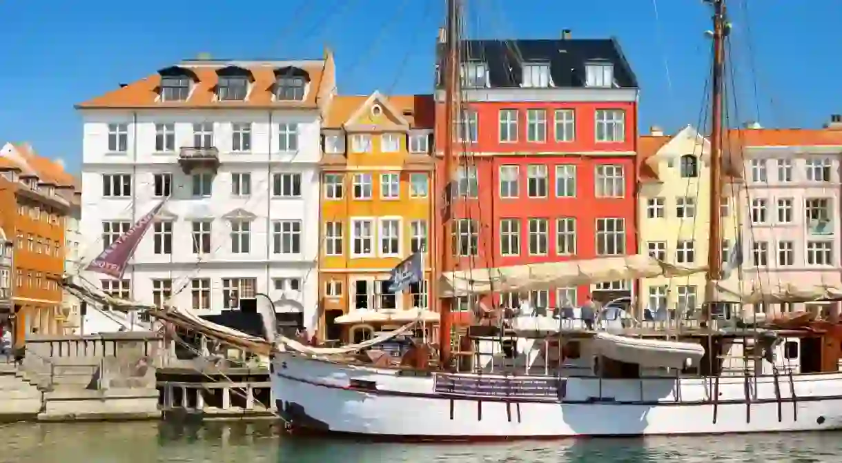 Relax as you stroll past Copenhagens colourful architecture and pretty canals