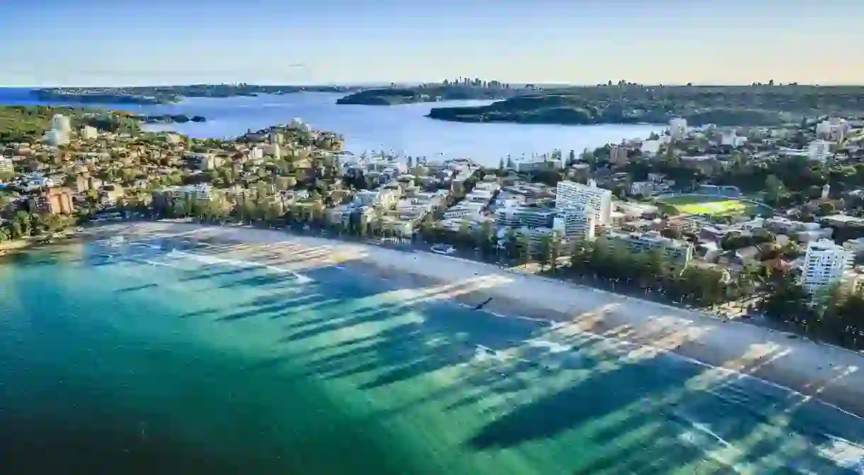 Immerse yourself in the sun, sea and surf of Sydney at Manly Beach