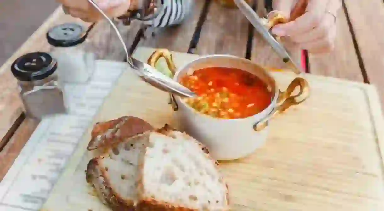 Traditional Hungarian goulash soup with a beautiful serving. The concept of local cuisine in Budapest