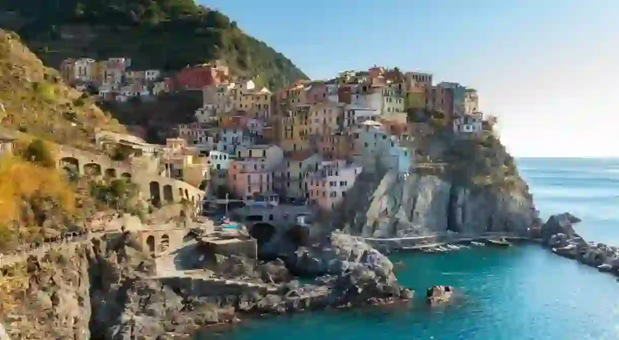 Enjoy the panoramic view of Manarolas colourful houses in the Cinque Terre National Park, Italy