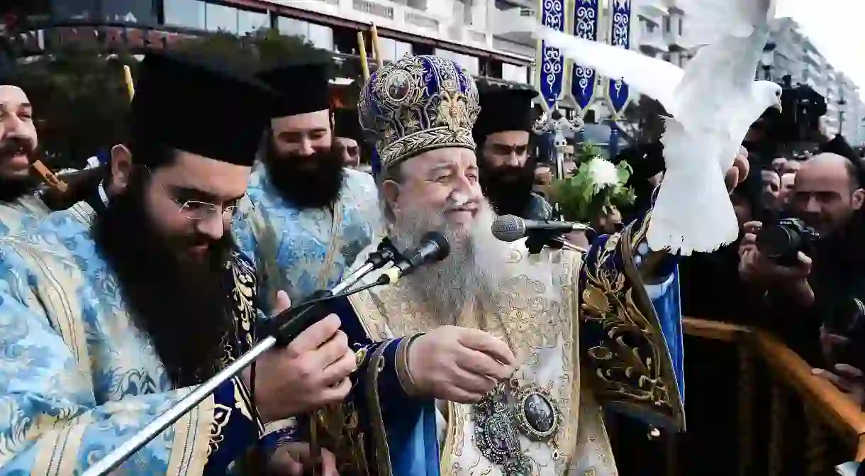 As the cross is brought back during the Blessing of the Water (Epiphany), the priest releases a white dove as a symbol of the Holy Spirit