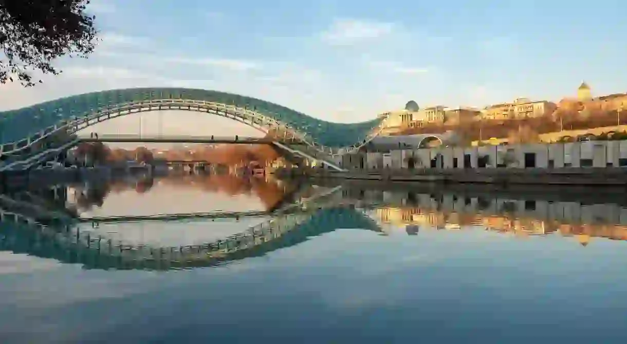 The Bridge of Peace spans the Kura River, and has become an emblem of downtown Tbilisi