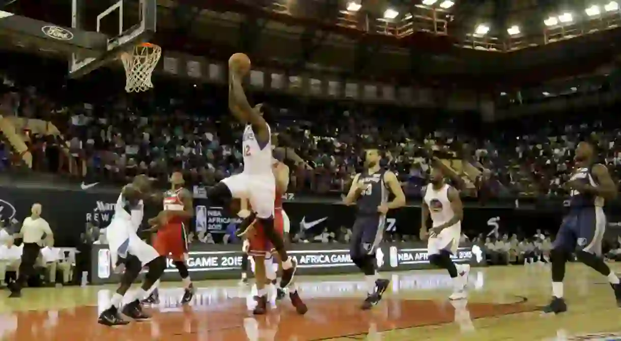 Luc Mbah a Moute slam dunks during a basketball match