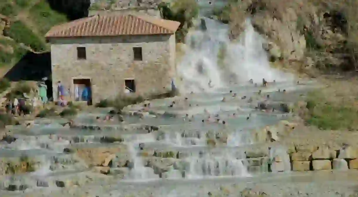 Between Florence and Rome, in the hills of Tuscany steam rises from bubbling natural pools and terraces