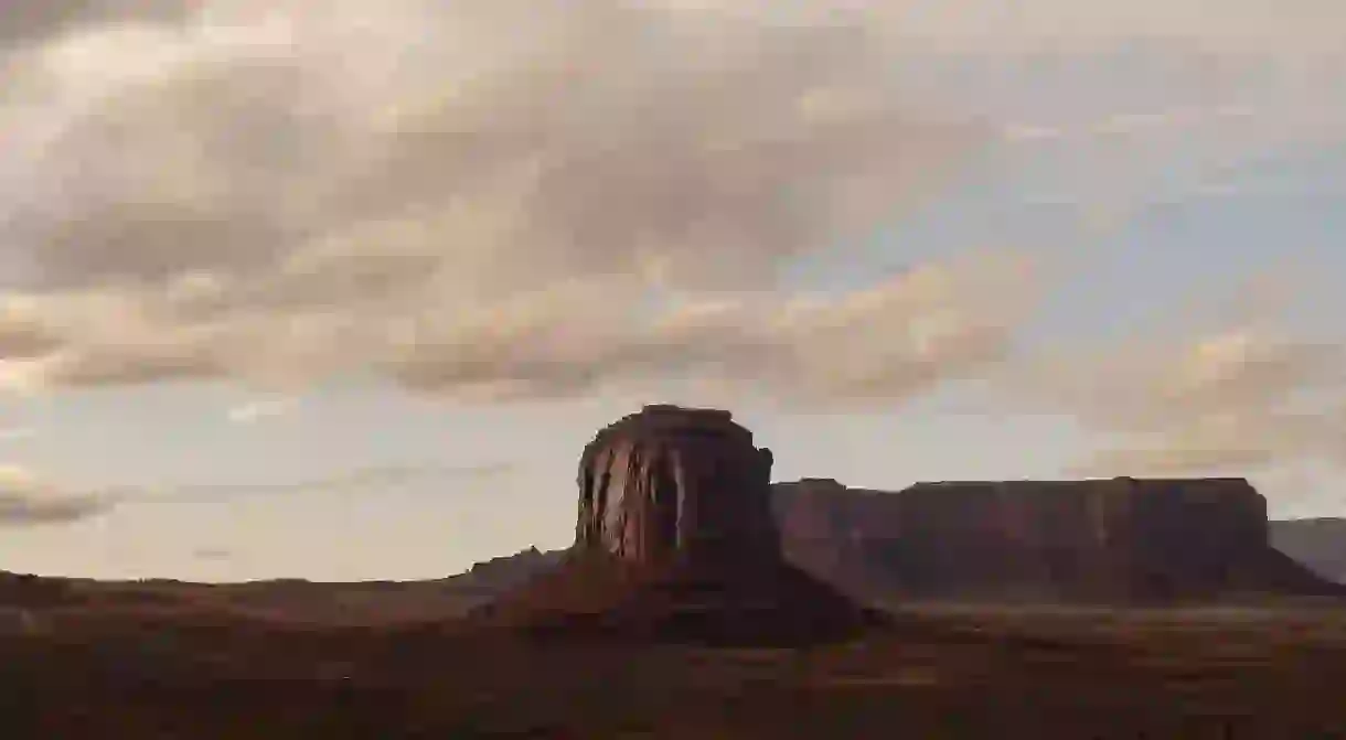 Monument Valley is located on the Arizona-Utah border and is home to numerous natural monuments that rise out of the desert landscape.