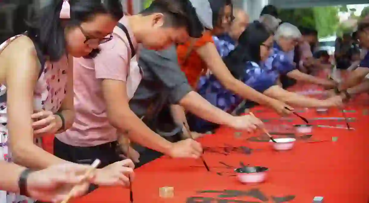 A moment of solidarity, as the local community in Kajang, Selangor in southwestern Malaysia wrote words of good wishes to fight COVID-19