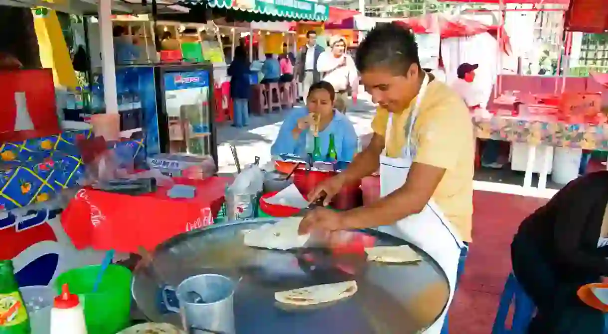 A food vendor makes quesadillas in Mexico City