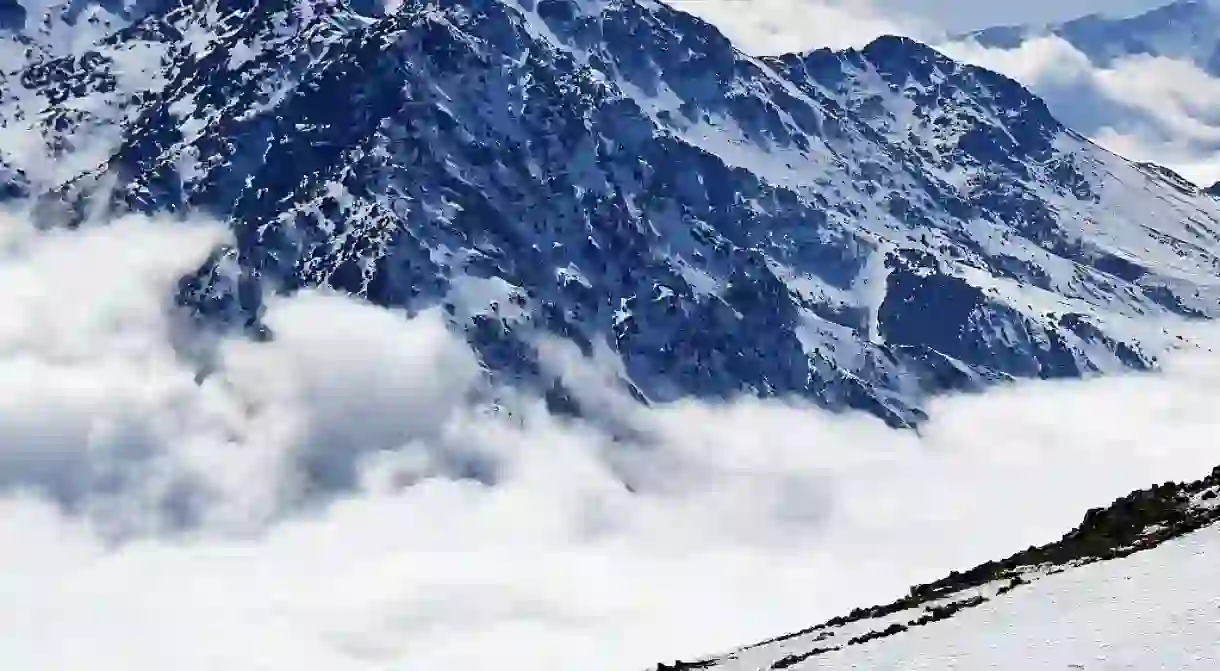 People walk on a slope at the Oukaïmeden ski resort