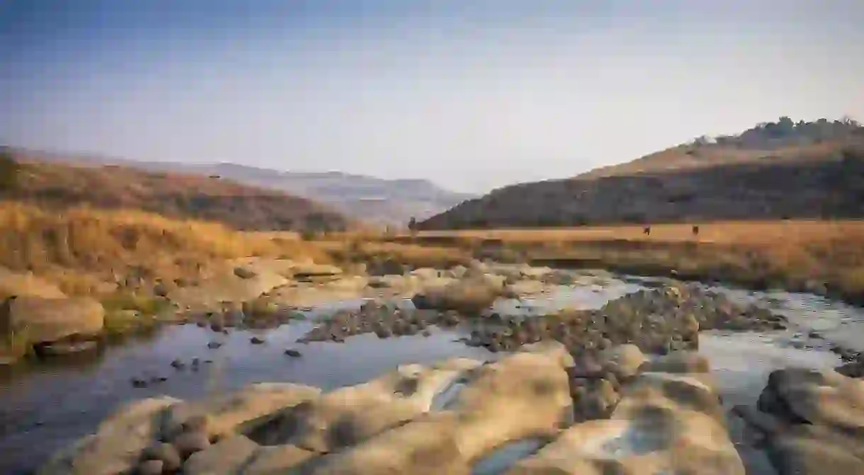 There is much to see outside Durban, like the Mhlwazini river in the Drakensberg mountains