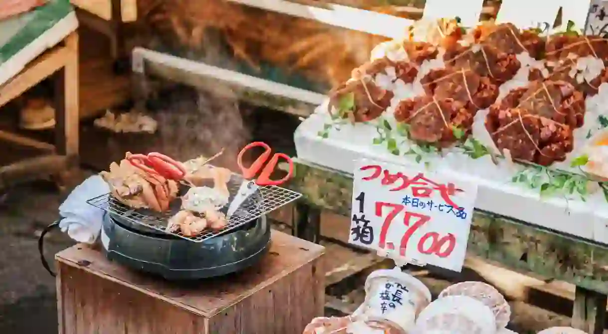 Japanese Kegani crabs grill on a stove in Hakodate