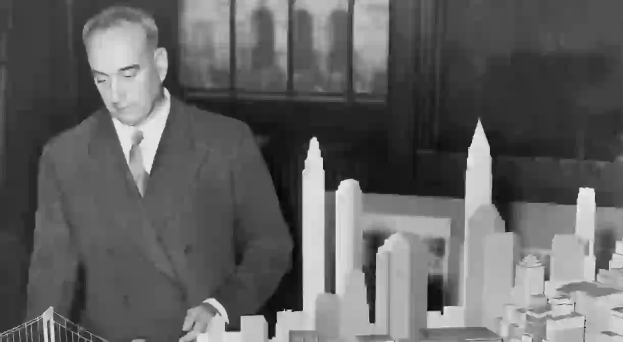 New York City Park Commissioner Robert Moses (1888-1981) with a model of the proposed Battery Bridge in 1939