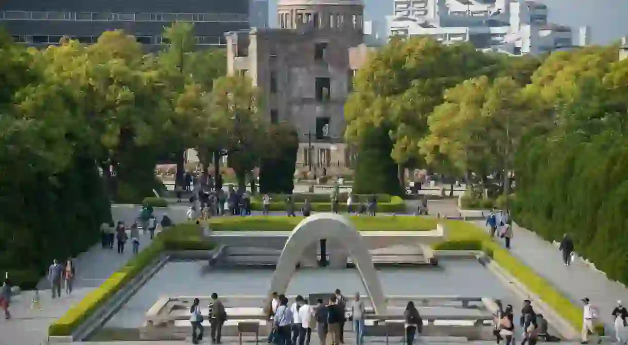 The Cenotaph and A-Bomb Dome in Hiroshima Peace Memorial Park, Japan