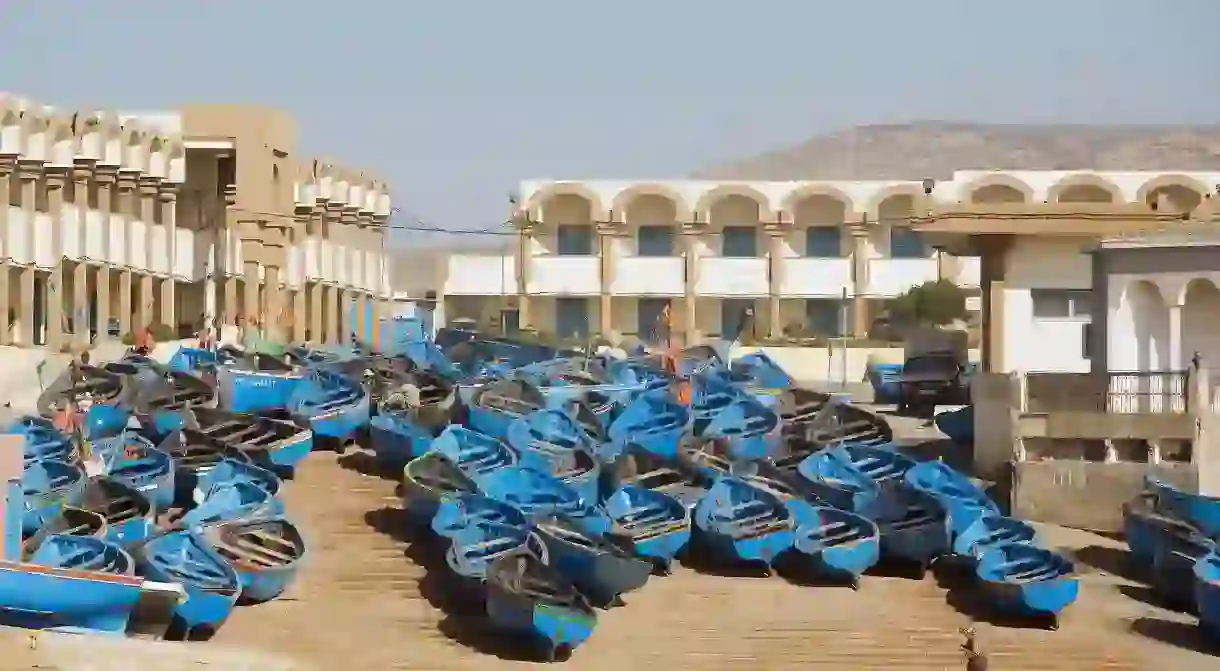 Fishing boats line up on the shore in Imsouane