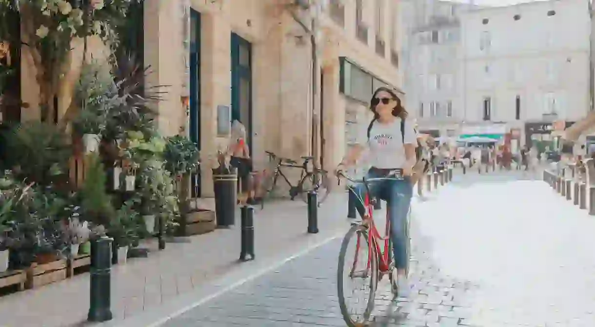 Cycling is just one of the many cheap and easy ways to get around during your trip to Bordeaux