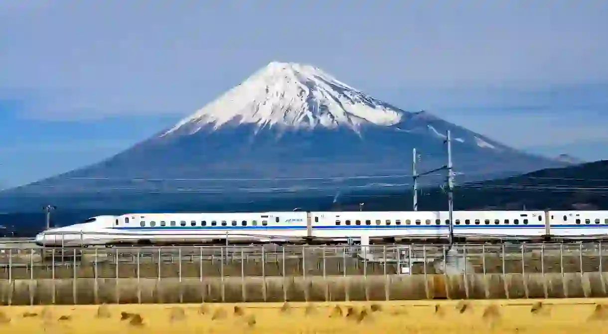 EN5DYN A Shinkansen bullet train passes below Mt. Fuji in Japan.