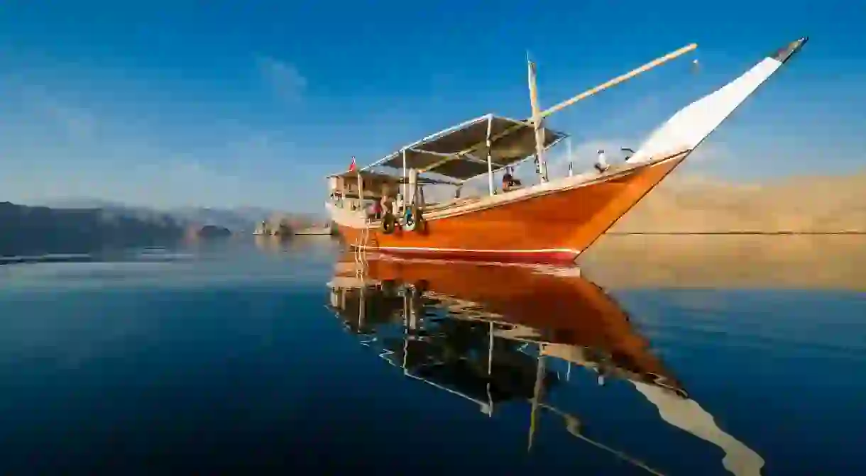 Take a cruise on a dhow, a traditional wooden ship