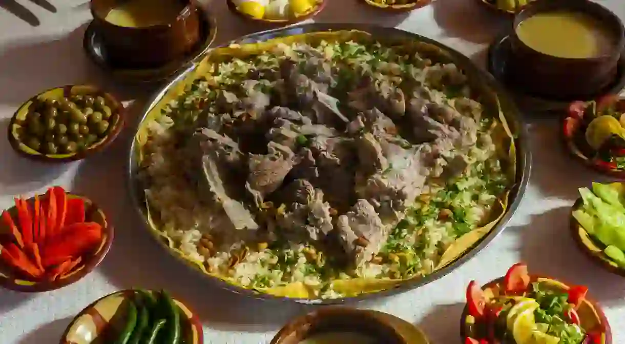 Mansaf (lamb cooked in a sauce of fermented dried yoghurt and served with rice) is the national dish of Jordan