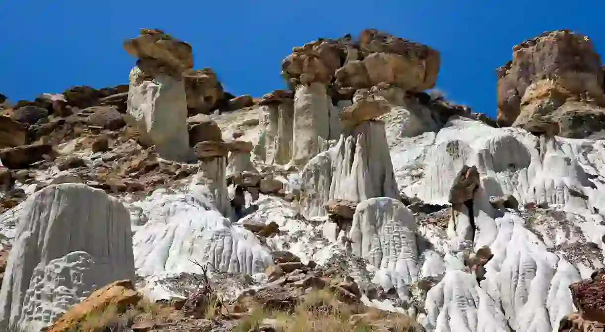 The beautiful Wahweap Hoodoos, white with red cap rocks, form part of the Grand Staircase-Escalante National Monument