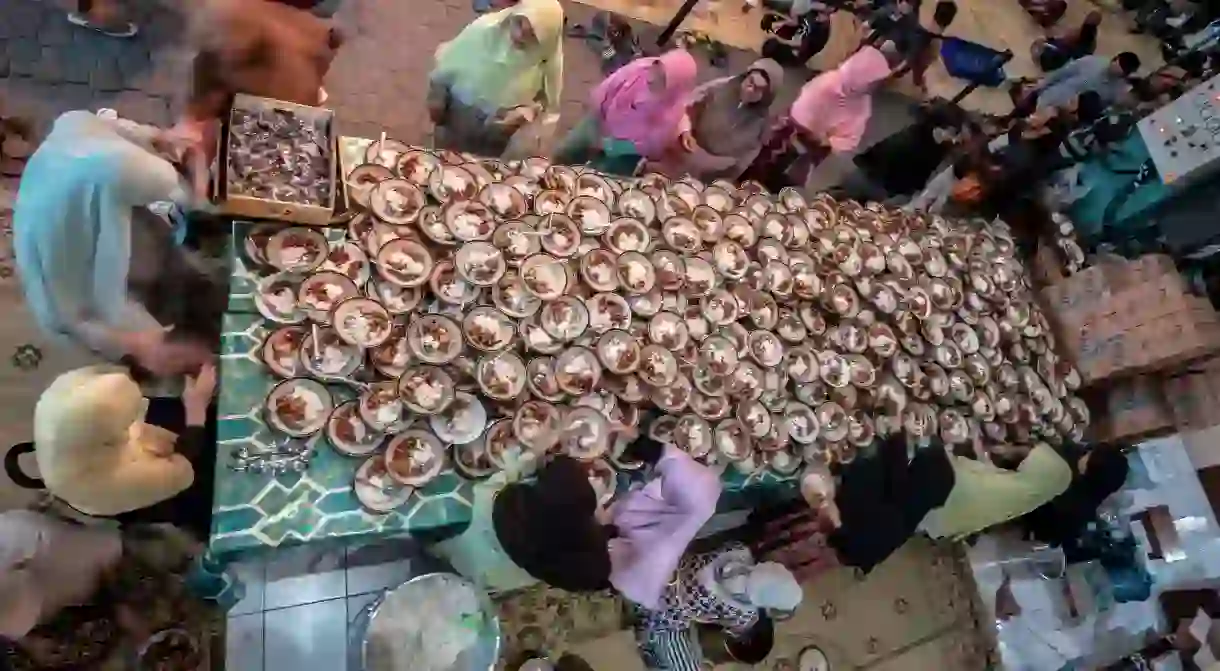 Muslims break their daily fast during Ramadan after sunset with iftar