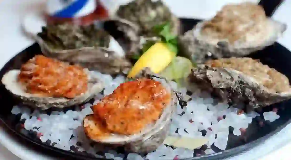 Baked oysters au gratin are a favourite in the New Orleans French Quarter