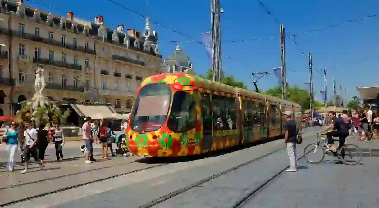 In Montpelliers historical centre the Ecusson tramway goes past Place de la Comedie